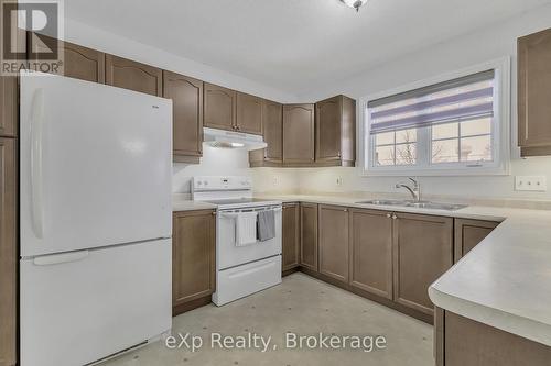 725 Binning Street W, North Perth (Listowel), ON - Indoor Photo Showing Kitchen With Double Sink