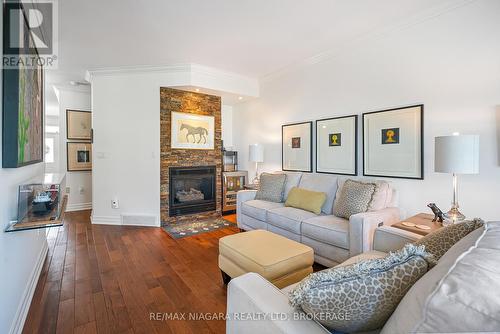 4 - 88 Lakeport Road, St. Catharines (Port Dalhousie), ON - Indoor Photo Showing Living Room With Fireplace