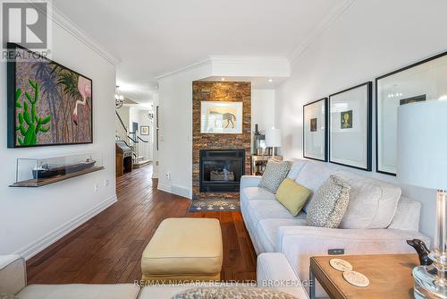 4 - 88 Lakeport Road, St. Catharines (Port Dalhousie), ON - Indoor Photo Showing Living Room With Fireplace
