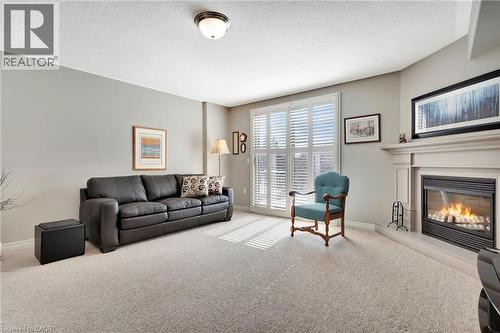 Walk-out - 20 Isherwood Avenue Unit# 5, Cambridge, ON - Indoor Photo Showing Living Room With Fireplace