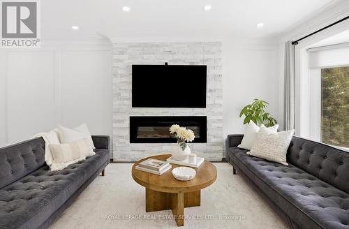 11 Benbow Road, Toronto, ON - Indoor Photo Showing Living Room With Fireplace