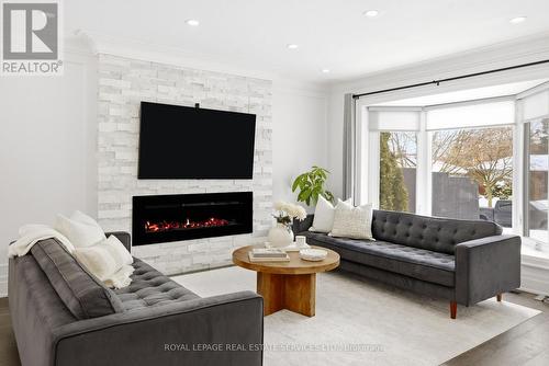 11 Benbow Road, Toronto, ON - Indoor Photo Showing Living Room With Fireplace