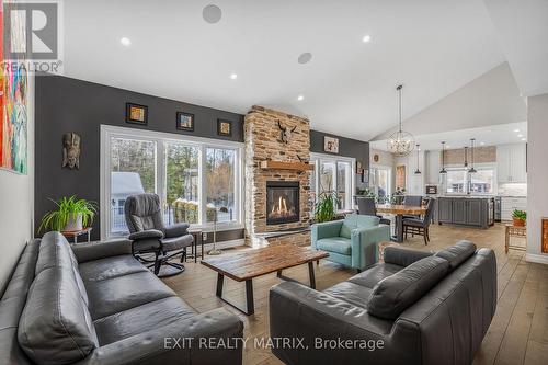 58 De La Seigneurie Street, Champlain, ON - Indoor Photo Showing Living Room With Fireplace