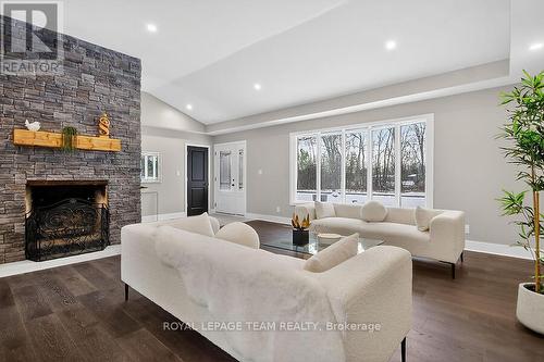 6636 Marina Drive, Ottawa, ON - Indoor Photo Showing Living Room With Fireplace