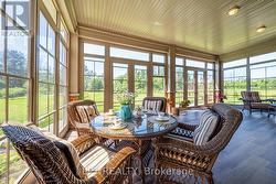 Sunroom Overlooking Property - 