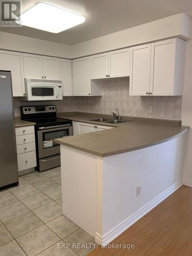 2120 - 25 Kingsbridge Garden Circle, Mississauga, ON - Indoor Photo Showing Kitchen With Double Sink