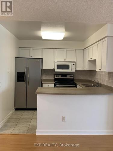 2120 - 25 Kingsbridge Garden Circle, Mississauga, ON - Indoor Photo Showing Kitchen With Double Sink