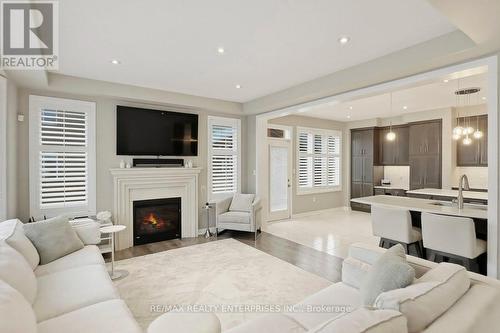 355 Wisteria Way, Oakville, ON - Indoor Photo Showing Living Room With Fireplace