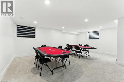 Game room with light carpet and recessed lighting - 9 Macneil Court, Port Burwell, ON - Indoor Photo Showing Other Room