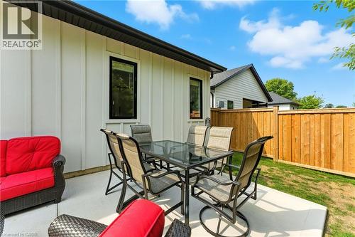 View of patio featuring outdoor dining space - 9 Macneil Court, Port Burwell, ON - Outdoor With Deck Patio Veranda With Exterior