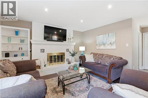 23 Vance Crescent, Waterdown, ON - Indoor Photo Showing Living Room With Fireplace