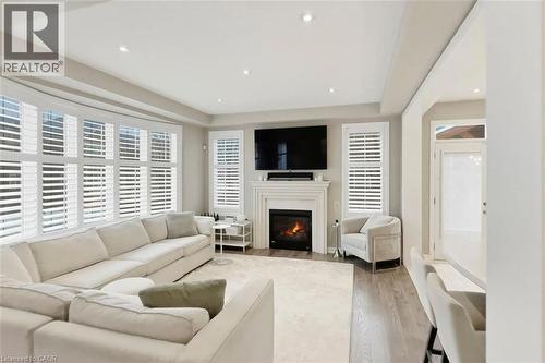 355 Wisteria Way, Oakville, ON - Indoor Photo Showing Living Room With Fireplace