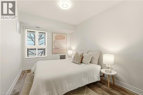 1045 Nadalin Heights Unit# 108, Milton, ON - Indoor Photo Showing Bedroom