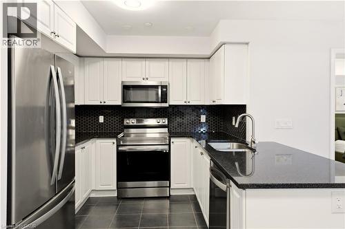 1045 Nadalin Heights Unit# 108, Milton, ON - Indoor Photo Showing Kitchen With Stainless Steel Kitchen With Upgraded Kitchen