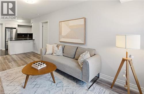 1045 Nadalin Heights Unit# 108, Milton, ON - Indoor Photo Showing Living Room