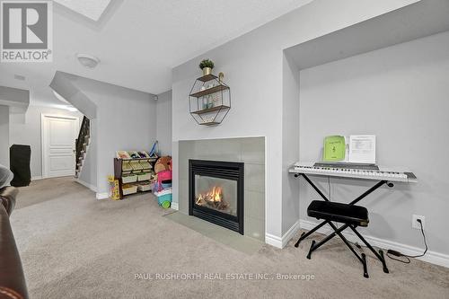 Basement-Rec Room - 560 Du Pin Rouge Way, Ottawa, ON - Indoor With Fireplace