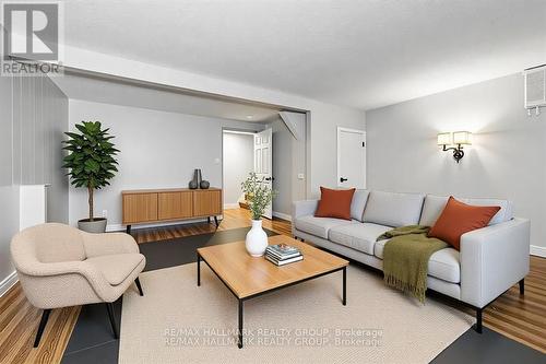 Photo Virtually Staged - 51 - 1803 Lamoureux Drive, Ottawa, ON - Indoor Photo Showing Living Room