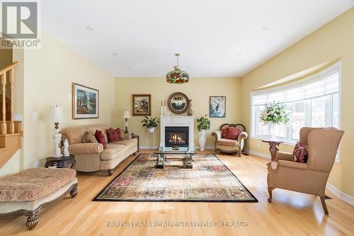 1041 Wickham Road, Innisfil, ON - Indoor Photo Showing Living Room With Fireplace