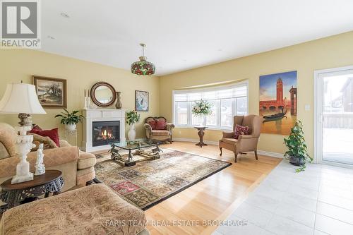1041 Wickham Road, Innisfil, ON - Indoor Photo Showing Living Room With Fireplace