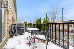 Deck overlooking patio and backyard - 