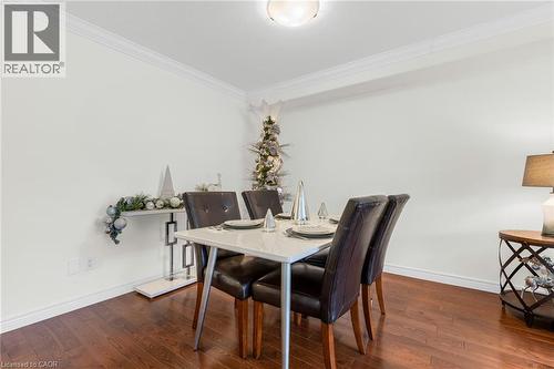 Hardwood floors, crown moulding - 45 Hemlock Way, Grimsby, ON - Indoor Photo Showing Dining Room