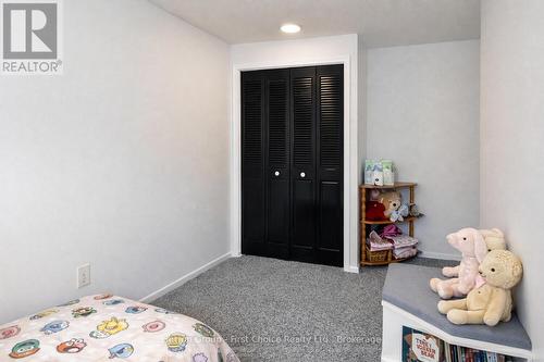 2nd Bedroom Closet - 12 - 91 Avonwood Drive, Stratford, ON - Indoor Photo Showing Bedroom