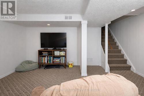Family Room in Basement - 12 - 91 Avonwood Drive, Stratford, ON - Indoor Photo Showing Other Room