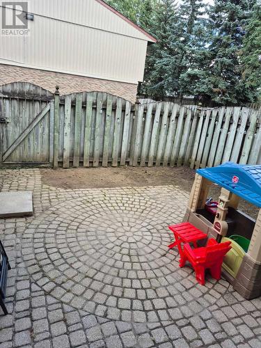 Fenced Yard - 12 - 91 Avonwood Drive, Stratford, ON - Outdoor With Deck Patio Veranda