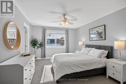 Primary bedroom with walk-in closet. - 