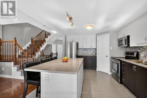 Gorgeous kitchen featuring a walk-in pantry! - 457 Barrick Hill Road, Ottawa, ON - Indoor Photo Showing Kitchen With Double Sink With Upgraded Kitchen