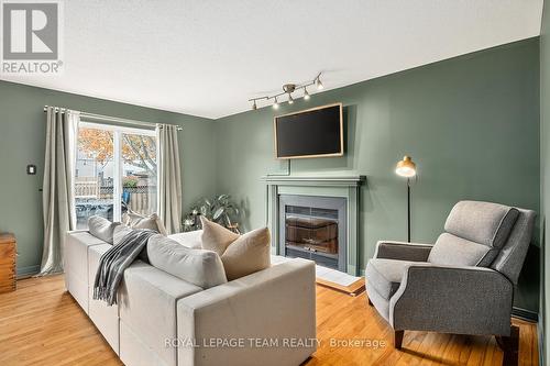 77 Armagh Way, Ottawa, ON - Indoor Photo Showing Living Room With Fireplace