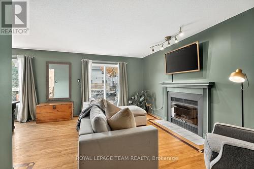 77 Armagh Way, Ottawa, ON - Indoor Photo Showing Living Room With Fireplace