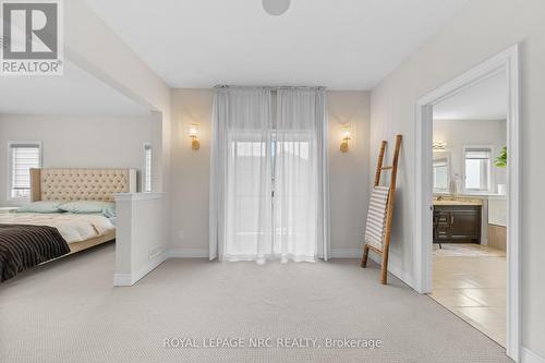Deck off the primary suite sitting area - 25 Philmori Boulevard, Pelham (Fonthill), ON - Indoor Photo Showing Bedroom