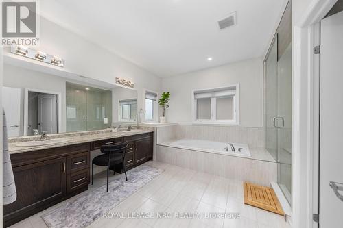 Dual sinks with quartz counte - 25 Philmori Boulevard, Pelham (Fonthill), ON - Indoor Photo Showing Bathroom