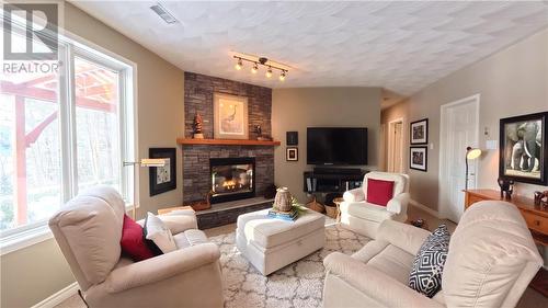 357 Clear Lake, Espanola, ON - Indoor Photo Showing Living Room With Fireplace