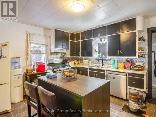 Kitchen with Island and Window - 839 Dufferin Street, Woodstock (Woodstock - South), ON - Indoor