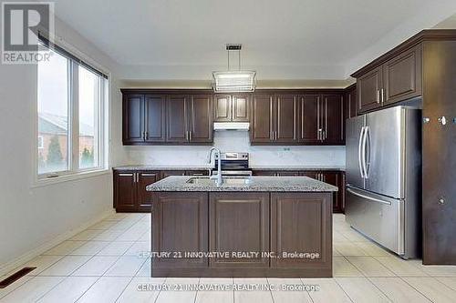 10 Hyderabad Lane, Markham, ON - Indoor Photo Showing Kitchen With Double Sink