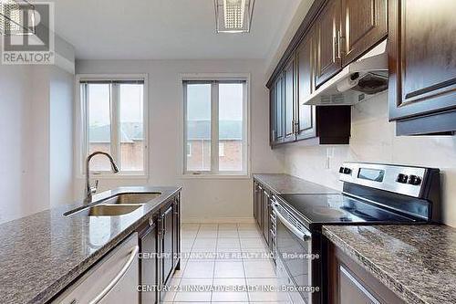10 Hyderabad Lane, Markham, ON - Indoor Photo Showing Kitchen With Double Sink