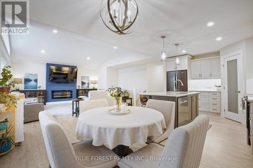 12 Auburn Drive, St. Thomas, ON - Indoor Photo Showing Dining Room With Fireplace