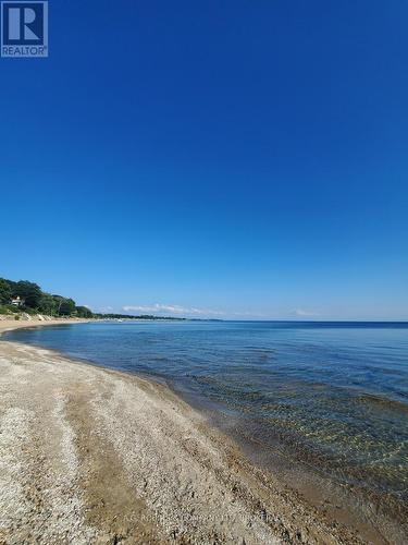 Silver bay beach summer shot - 972 Silver Bay Road, Port Colborne (Sherkston), ON - Outdoor With Body Of Water With View