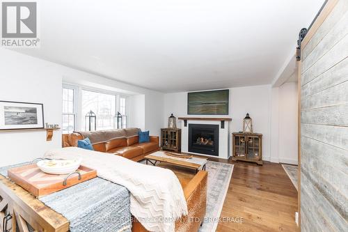 972 Silver Bay Road, Port Colborne (Sherkston), ON - Indoor Photo Showing Living Room With Fireplace