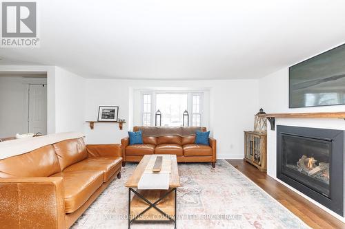 972 Silver Bay Road, Port Colborne (Sherkston), ON - Indoor Photo Showing Living Room With Fireplace