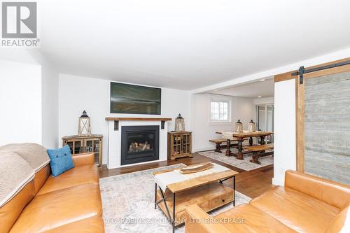 972 Silver Bay Road, Port Colborne (Sherkston), ON - Indoor Photo Showing Living Room With Fireplace