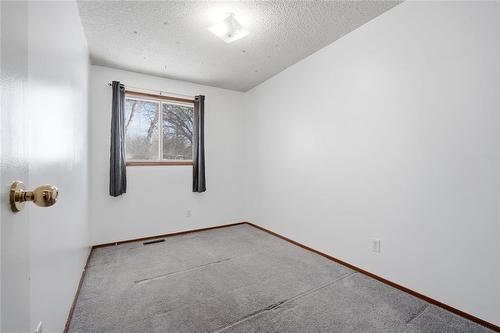 Bedroom - 46 Donan Street, Winnipeg, MB - Indoor Photo Showing Other Room