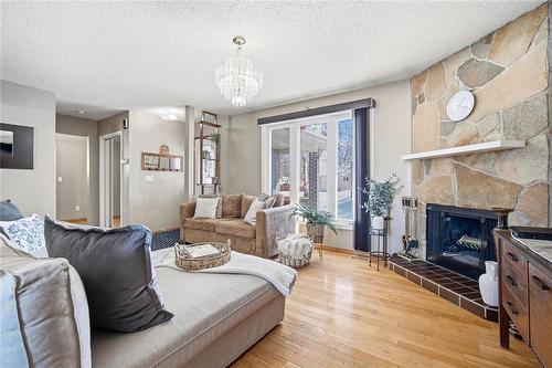 46 Donan Street, Winnipeg, MB - Indoor Photo Showing Living Room With Fireplace