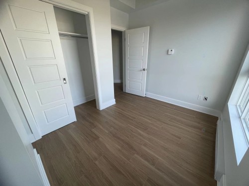 Chambre à coucher - 308-850 Rue Ouimet, Montréal (Saint-Laurent), QC - Indoor Photo Showing Other Room