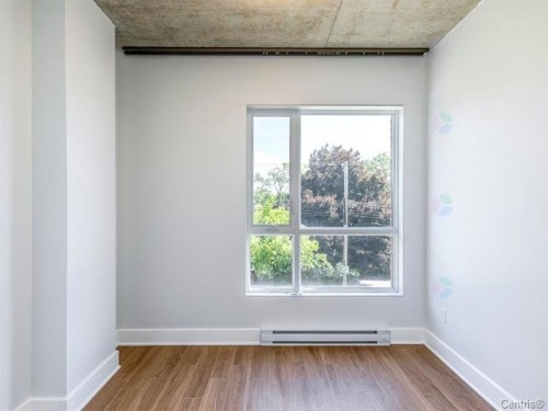 Chambre à coucher - 308-850 Rue Ouimet, Montréal (Saint-Laurent), QC - Indoor Photo Showing Other Room