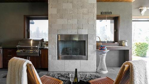 3990 Fairwinds Court, Kelowna, BC - Indoor With Fireplace