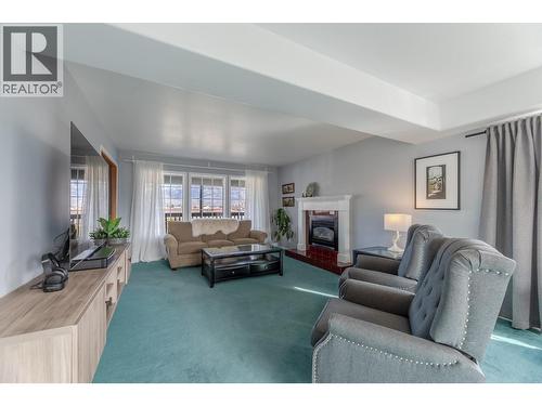 445 Road 5, Oliver, BC - Indoor Photo Showing Living Room With Fireplace