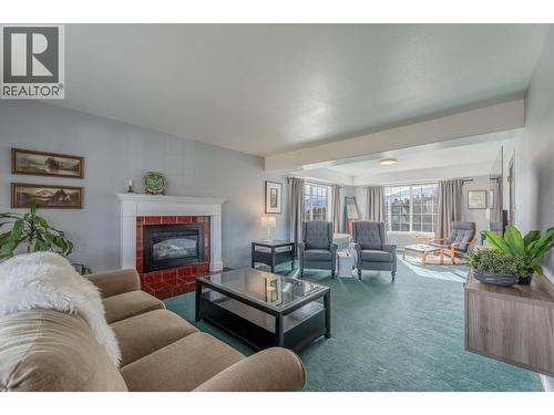 445 Road 5, Oliver, BC - Indoor Photo Showing Living Room With Fireplace